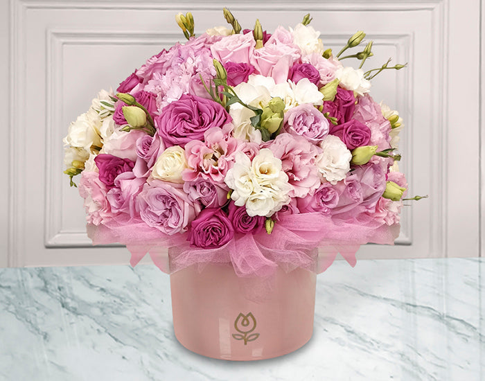 Arreglo de Rosas con un acento de Moda | CHER